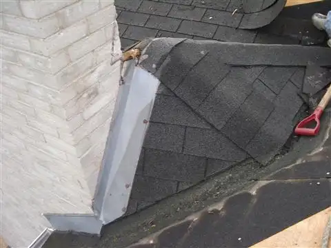 Completed roofing project with new shingles