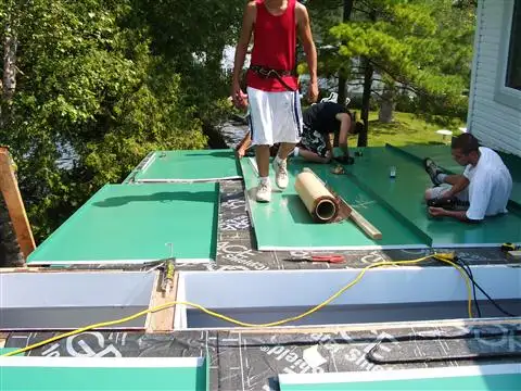 Custom pre-painted metal roofing installed on a home