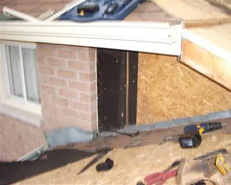 Repairing flashing and shingles on a home roof