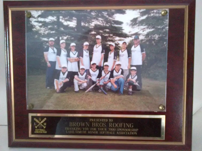 A local sports team sponsored by Brown Bros Roofing