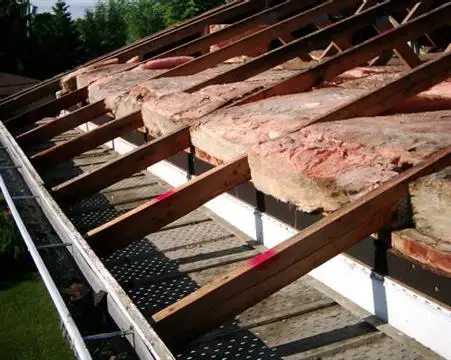 Attic vent detail on a completed roof