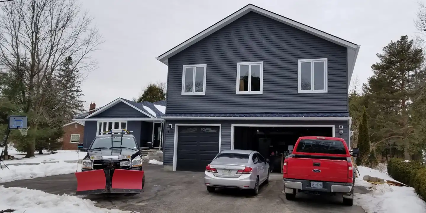 A completed asphalt shingle roof on a Keswick-area home